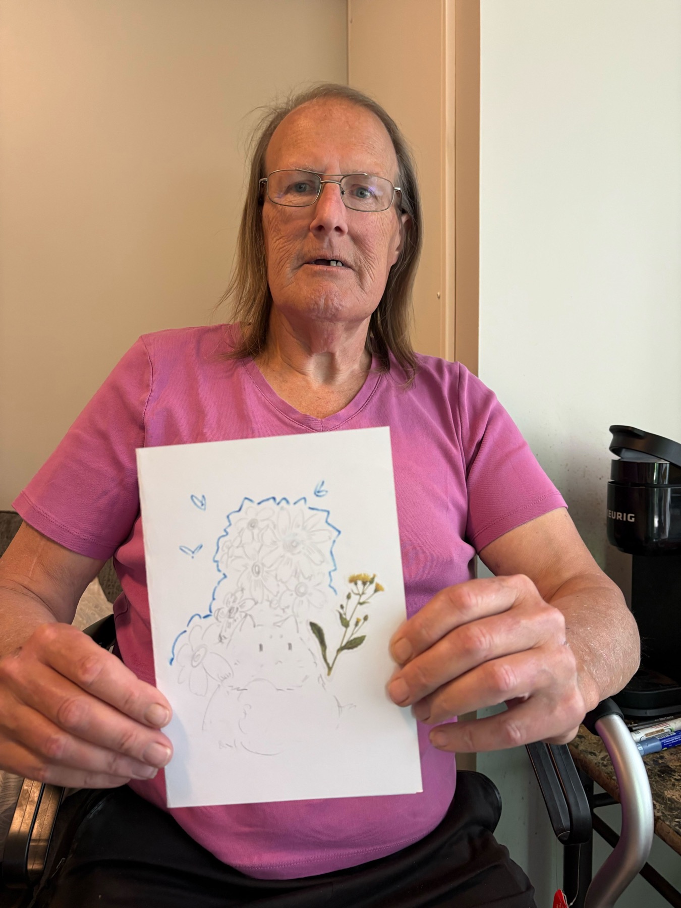 A veteran holding a student letter