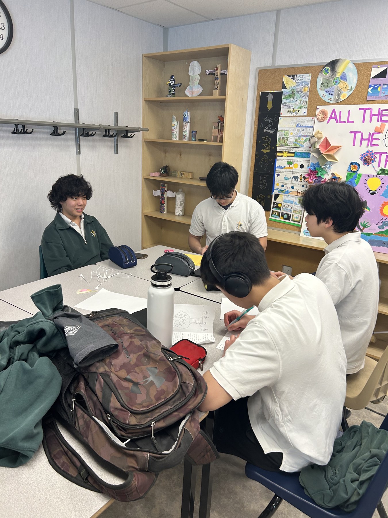Students working together on letters in a classroom